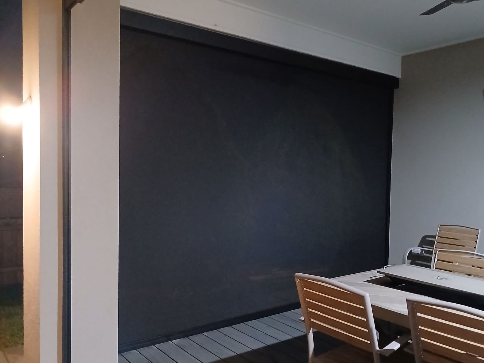Outdoor zip screen enclosure, evening